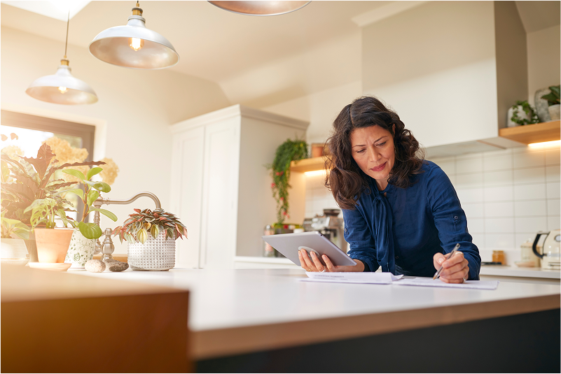 mature woman with digital tablet reviewing domesti 2024 10 20 15 03 58 utc 1