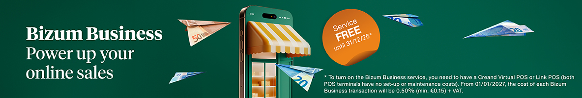 Creand Digital 2 Bizum Business promotional banner with the headline "Power up your online sales". The visual features a smartphone with a storefront awning and paper planes made of Euro banknotes flying around it. An orange badge promotes "Service FREE until 31/12/26". Small print at the bottom explains that a Creand Virtual POS or Link POS is required and that, starting 01/01/2027, the transaction fee will be 0.50% (min. €0.15) + VAT.